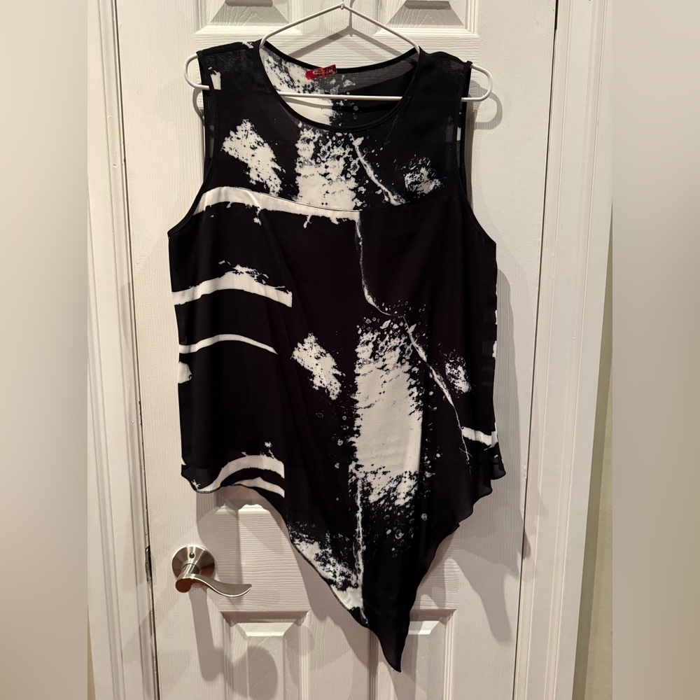 Designer blouse with asymmetrical hem